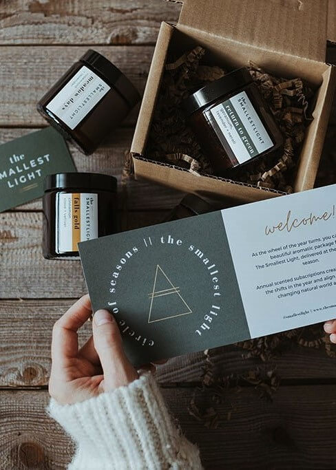 Packing the seasonal candle subscriptions at The Smallest Light 